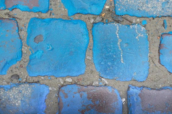 Blue stone texture, vintage paving stones painted blue