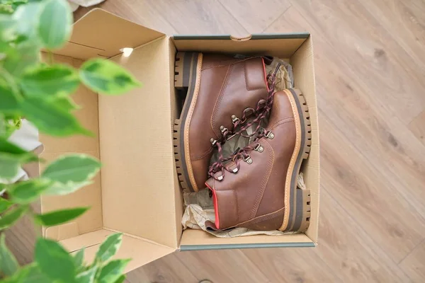 New womens leather brown waterproof winter boots in box — Stock Photo, Image