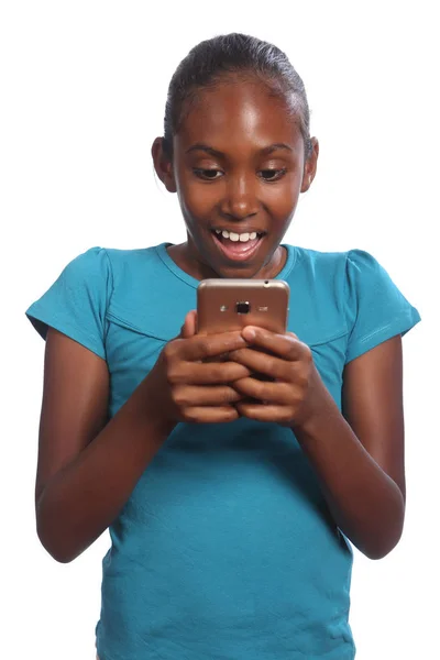 Happy black school girl receiving text message — Stock Photo, Image