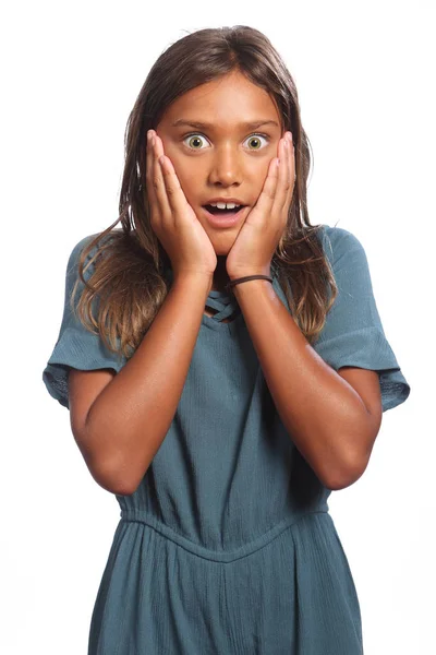 Young mixed race school girl surprised expression — Stock Photo, Image