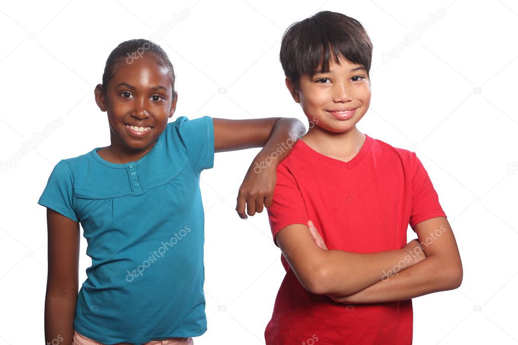Boy and girl multi-racial pair happy school kids