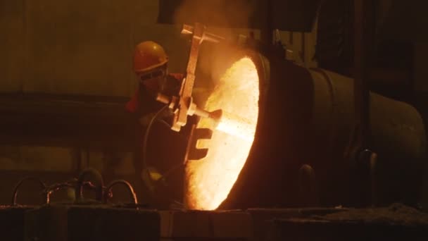 Skilled Worker Protective Wear Glasses Turns Tank Hot Liquid Metal — Stock Video