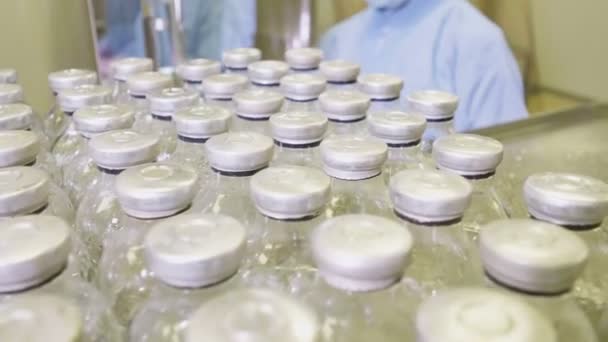 Closeup Specialist Protective Blue Uniform Puts Glass Bottles Chemical Liquid — Stock Video