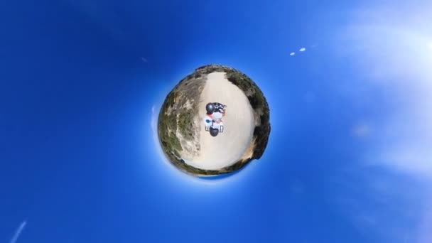 Spherical Panorama 360 Man Protective Helmet Rides Motorcycle Exotic Plants — Stock Video