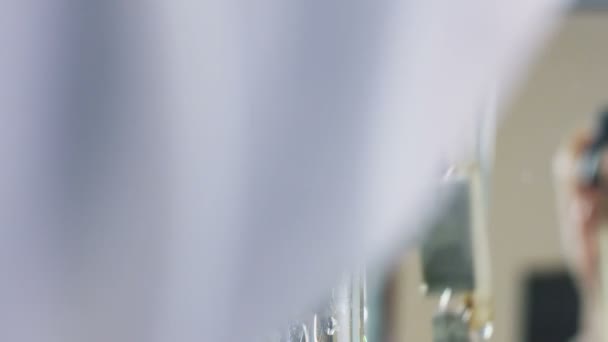 Closeup Lab Assistant Hand Puts Connected Metal Pieces Glass Tube — Stock Video