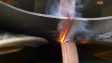 closeup makine parçaları dönüş yuvarlak ve metal tüp lehim