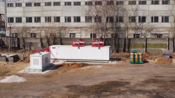 Upper view bright white mining farm building among plant area — Stock Video