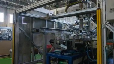 Robotik Kol ile Timelapse makine metal çubukları kaldırır