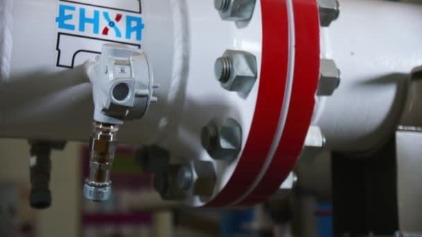 Motion to large flange connecting details of pipeline system — Stock Footage Motion to large flange connecting details of pipeline system Stock Video