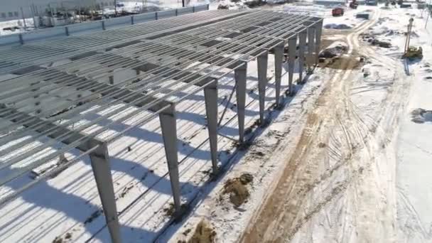 Canal del futuro edificio de almacén en el sitio de la planta nevada — Vídeos de Stock