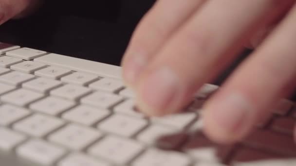 Blurred Movie Hands Typing White Keyboard — Stock Video