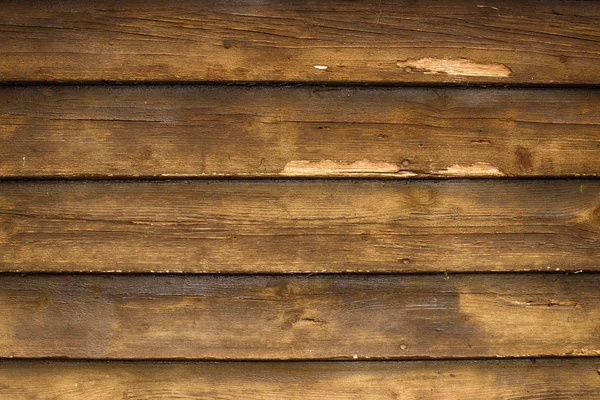 Παλιό τραχύ σκούρο ξύλινο τείχος. Τραχύ ξύλινο φόντο — Φωτογραφία Αρχείου