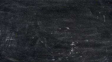 Soyut arkaplan. Buğday unu lekeleri eski siyah kabartma çarşafında. Üst görünüm