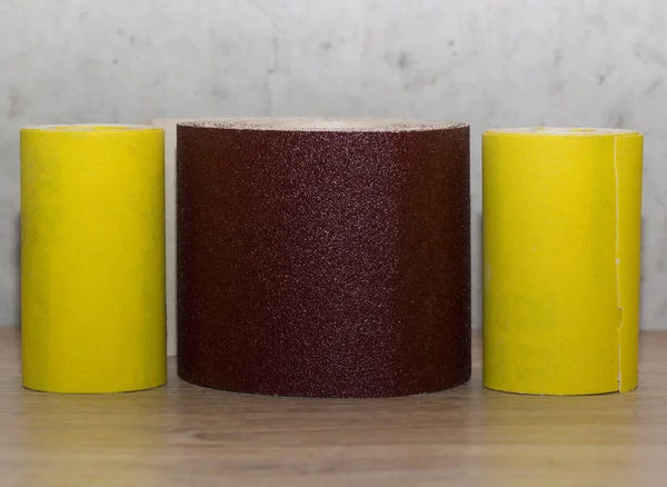 Roll of brown and yellow sandpapers — Stock Image Roll Brown Yellow Sandpapers Stock Image
