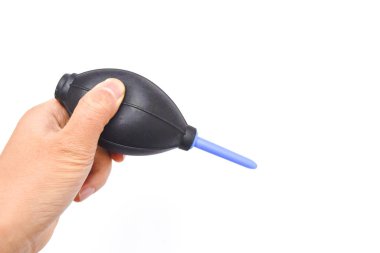 Toz üfleyici ya da tozdan hava pompası tutarken