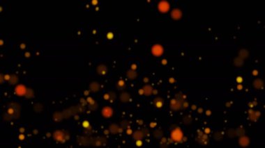 Parlayan ışıklar arka plan, sarı altın turuncu bulanık ışıklar ve parçacıklar çalkantılı sürüsü, siyah arka plan.