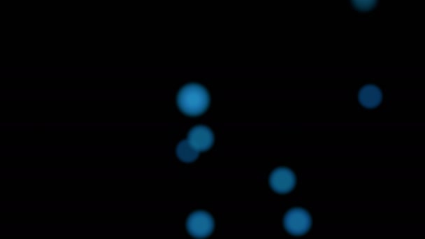 Fond bokeh abstrait avec de nombreuses lumières bleues floues volantes 