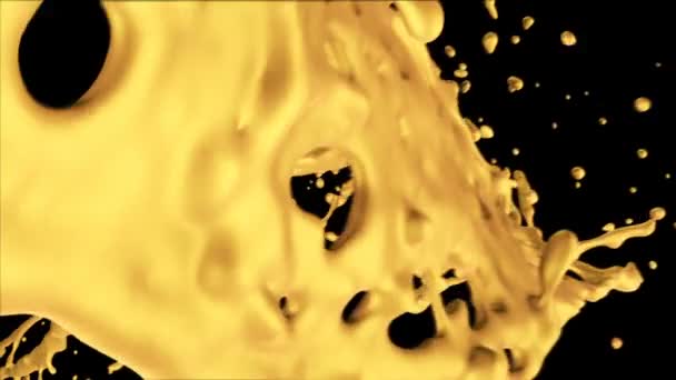 Spatten Van Goud Slow Motion Geïsoleerd Zwart — Stockvideo