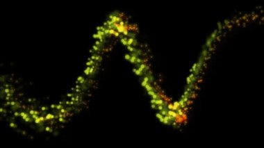 Dalgalı hareketle akan yeşil ve kırmızı parlayan parçacıklar, siyah arka plan üzerinde. 