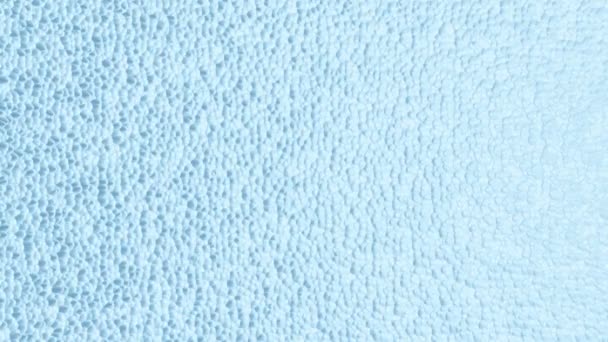 小さなモーフィング気泡の抽象的な青い背景 シームレスなループ — ストック動画