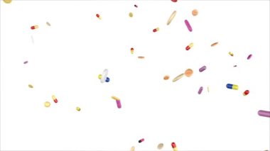 Beyaz arka planda izole renkli ilaçların yakın çekim, düşen. 