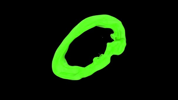 Bague éclaboussante de formes de peinture verte balle, isolé sur fond noir . 