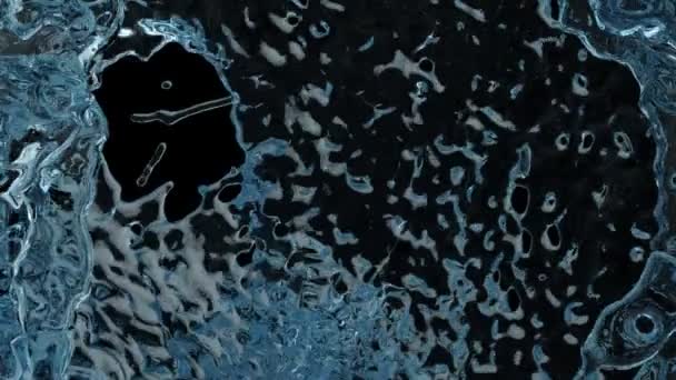 Hellblaues Wasser Das Die Leinwand Spritzt Isoliert Auf Schwarzem Hintergrund — Stockvideo