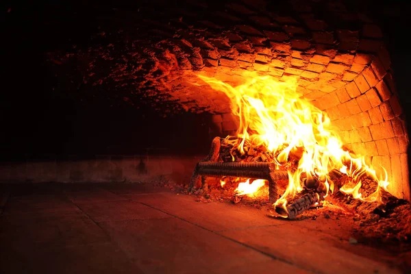 Fire wood burning in the oven