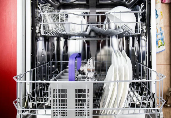 using dishwasher to save time in cleaning plates and glassware and routinely clean dirty dishes for hygiene with technology to remove stains