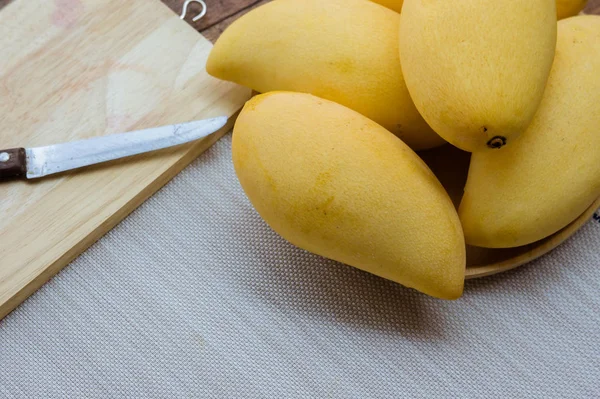 Sweet yellow mango fruit  on wood table , ready to eat for healt — Stock Photo, Image