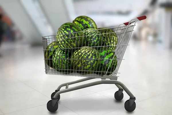 watermelons in the shopping cart at bokeh blurred shop background. Natural organic vegetarian food.