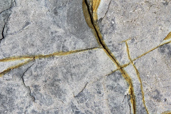 グレー侵食亀裂石表面のテクスチャ — ストック写真