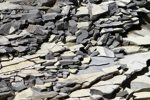 灰色と黒の石をすぐに石のテクスチャを粉砕 — ストック写真
