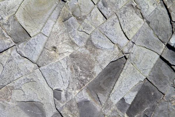 亀裂の灰色の粗い石表面の質感 — ストック写真