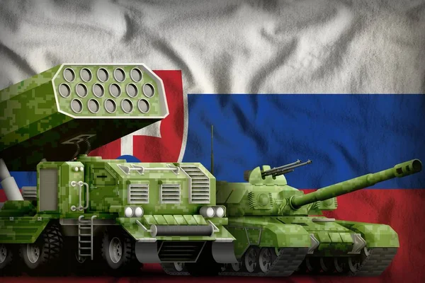 tank and missile launcher with summer pixel camouflage on the Slovakia flag background. Slovakia heavy military armored vehicles concept. 3d Illustration