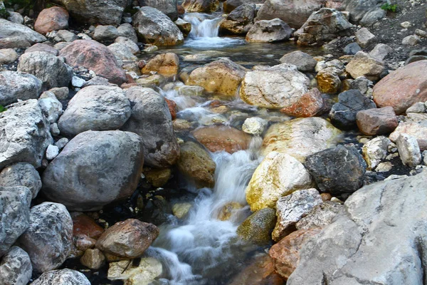 Photo of nature - spring water mountain river shot with long exposure and the nice petrous creek on North Caucasus