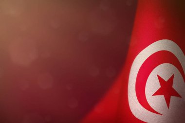 Tunus şeref Gaziler günü veya anma günü için bayrak kırmızı kadife koyu arka plan üzerinde asılı. Tunus zafer için savaş kavramı kahramanları.