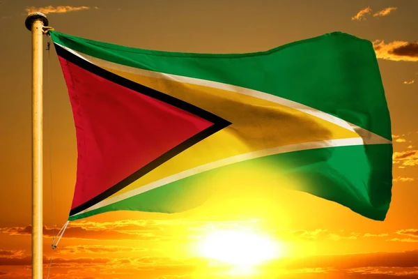Bandiera Guyana Tessitura Sullo Sfondo Bellissimo Tramonto Arancione — Foto Stock