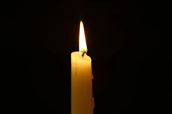 Tiny Paraffin Burning Yellow Candle Vivid Flame Dark Background — Stock Photo, Image