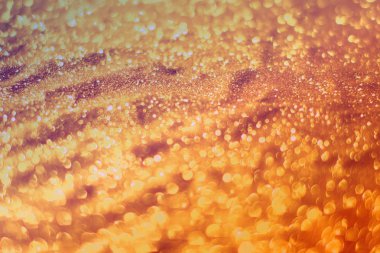 pırıltılar - kavram bokeh doku - soyut fotoğraf arka plan ile parlayan güzel parlak bakır kum yapılmış