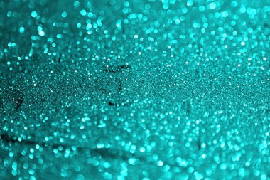 cute light blue brilliant aluminium sand made of glitters - shining concept with bokeh texture - abstract photo background clipart