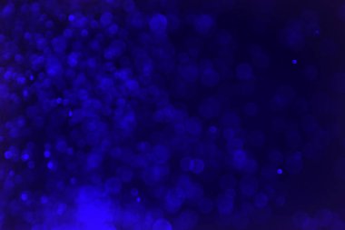 fantastik birçok düşen parlak bir renk bokeh doku - soyut fotoğraf arka plan mavi
