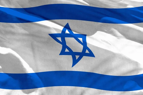 Schwenkt israel flag zur Verwendung als Textur oder Hintergrund, die Flagge flattert im Wind — Stockfoto