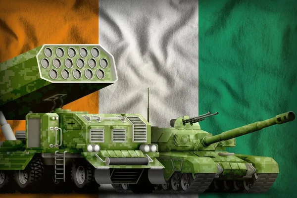 Cote d Ivoire heavy military armored vehicles concept on the national flag background. 3d Illustration
