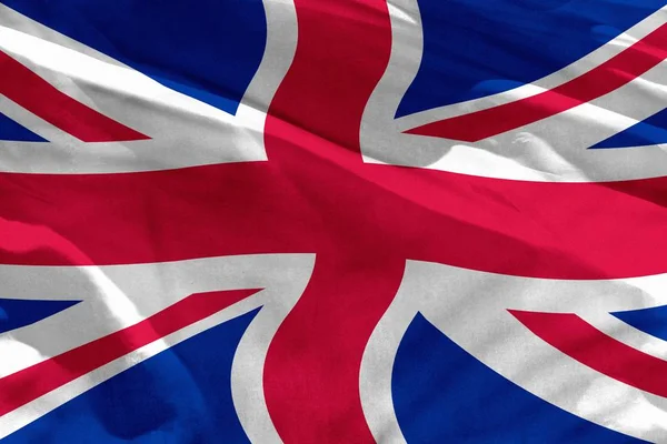 Waving United Kingdom (UK) flag for using as texture or background, the flag is fluttering on the wind — Stock Photo, Image