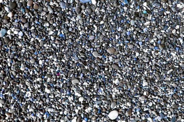 Geschilderde rivier stenen NAT door golven textuur-prachtige abstracte foto achtergrond — Stockfoto