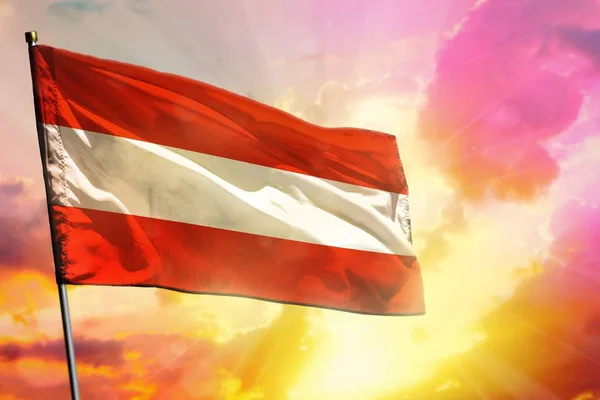 Fluttering Austria flag on beautiful colorful sunset or sunrise background. Success concept. — Stock Photo, Image