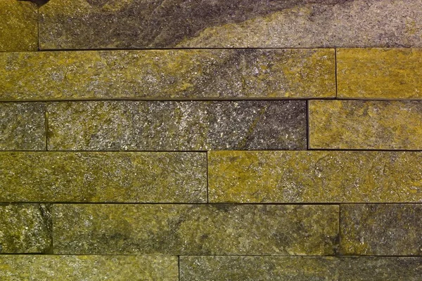 Nice grunge yellow natural quartzite stone bricks texture for use as background. — Stock Photo, Image