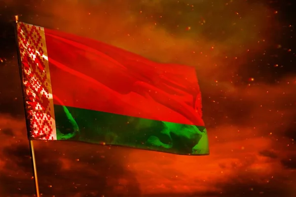 Fluttering Belarus flag on crimson red sky with smoke pillars background. Troubles concept.