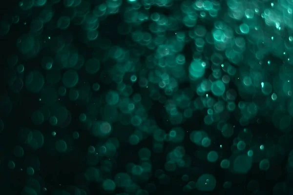 Hellblau viele fallende Lichter eine Farbe Bokeh Textur - ziemlich abstrakte Foto Hintergrund — Stockfoto